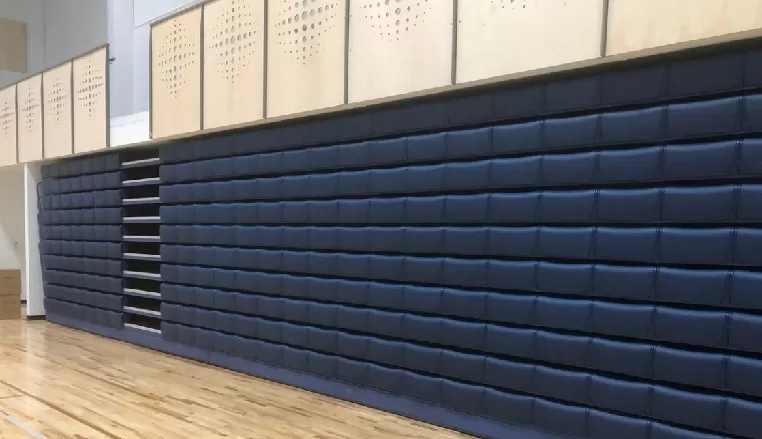 Retractable seating recessed under the balcony