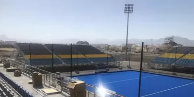 Metal demountable grandstands installed at FIH Hockey 5s World Cup Oman 2024 venue, featuring blue hockey pitch and modular seating systems