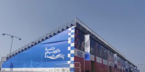 Large-scale metal demountable grandstand structure for Jeddah F1 event, displaying event branding and modular design