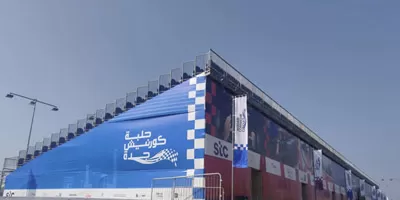 Large-scale metal demountable grandstand structure for Jeddah F1 event, displaying event branding and modular design