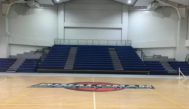 Blue bench folding bleachers (retractable seating) detail in Binalonan Gymnasium